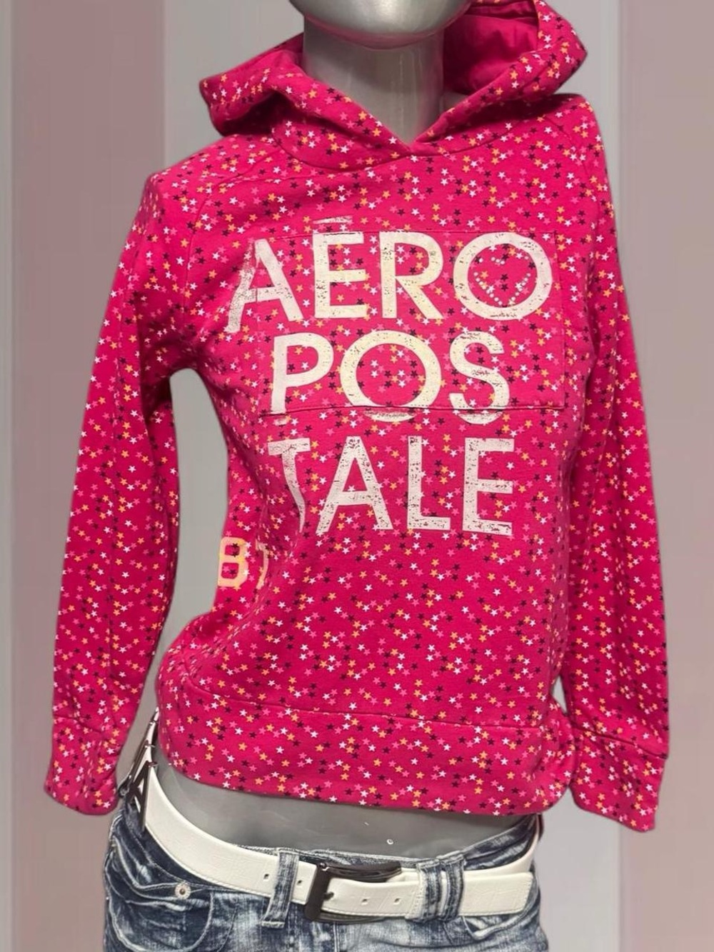 Aeropostale pink hoodie with white text and stars.